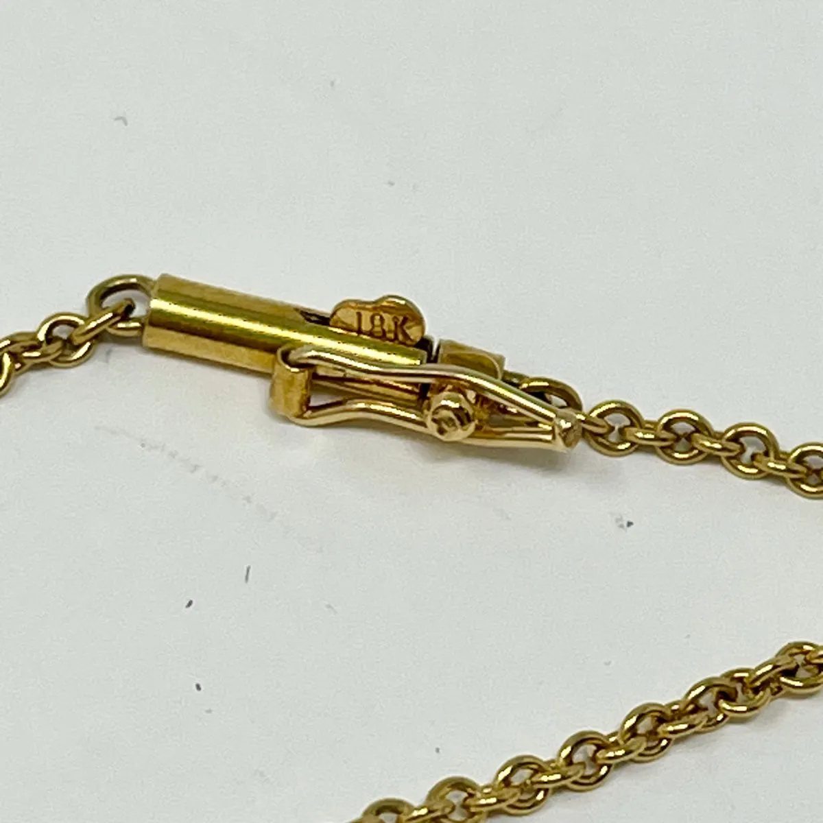 18K Gold Necklace with Invisibly Bezel Set 4 Triangular Shaped Diamonds