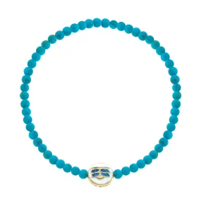 Horus Eyes Enameled Small Disk on Turquoise Beaded Bracelet