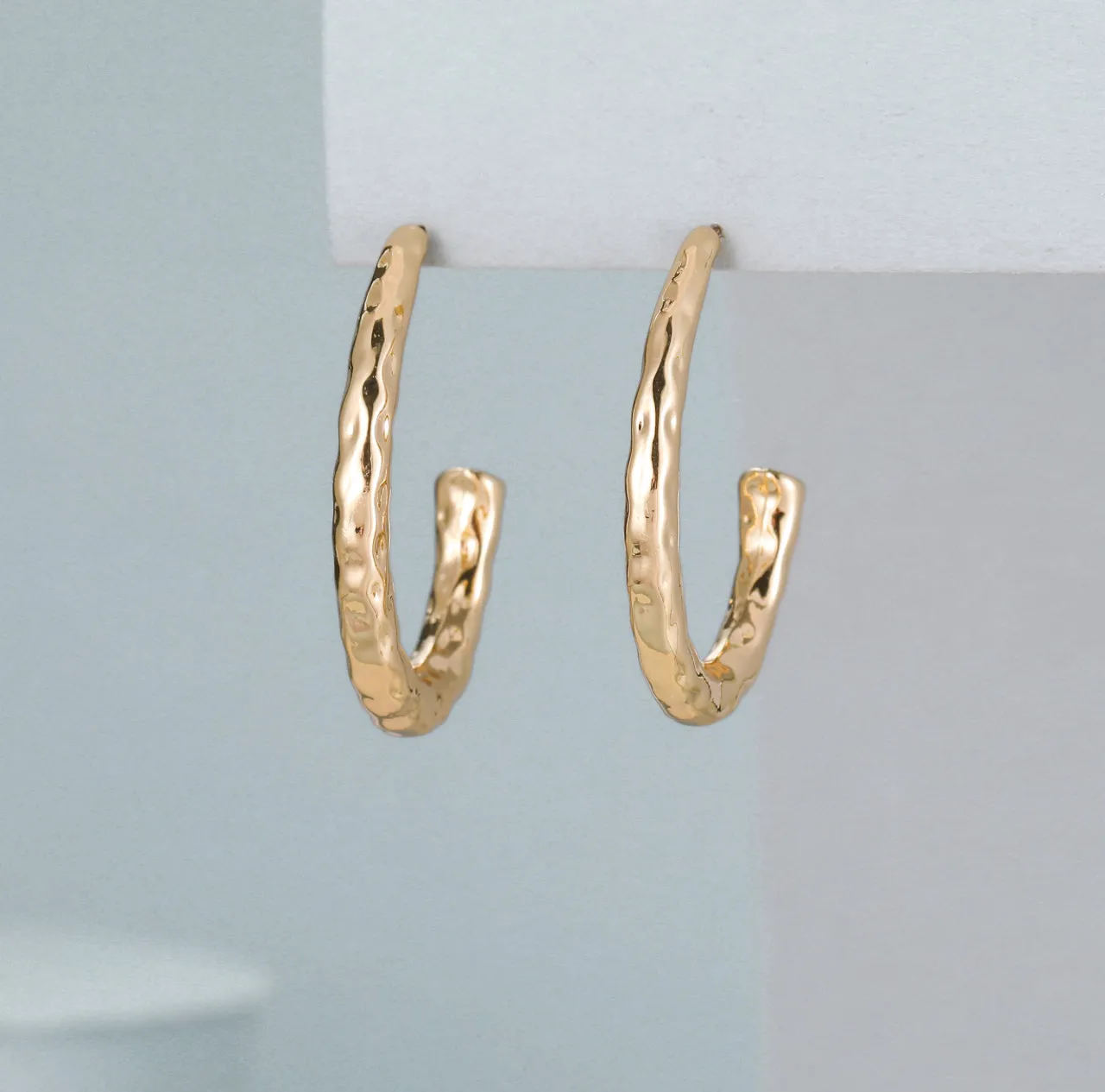 Topsie Gold Hammered Oval Hoop Earrings